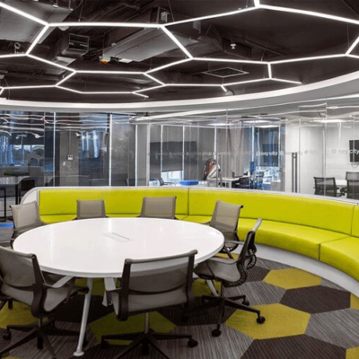 Customizable hexagon LED lights on the ceiling for office spaces